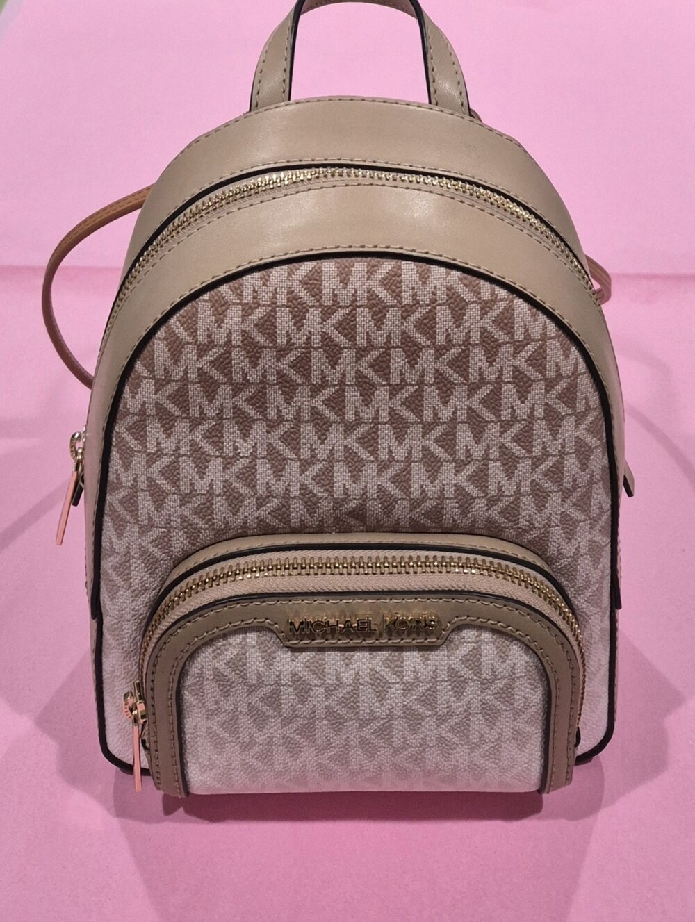 *NWOT* Michael Kors Tan and White Signature Mini Backpack  (8.5"H x 7"W x 3.5"D)